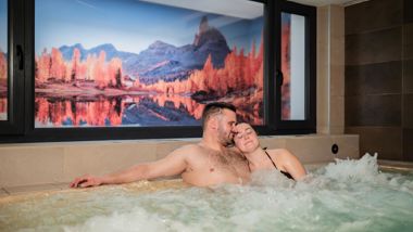A couple in the indoor whirlpool