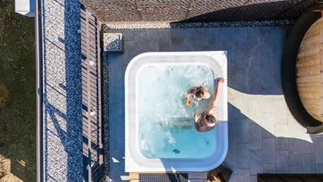 A couple in the outdoor whirlpool