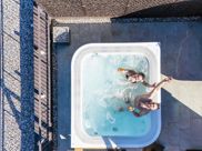 A couple in the outdoor whirlpool