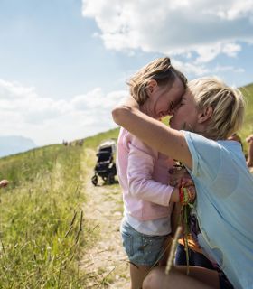 A family is having fun during a hike
