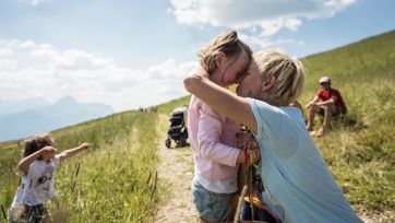 A family is having fun during a hike